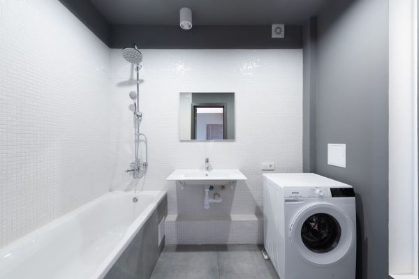 Clever ideas for seamlessly incorporating a laundry area into your luton bathroom design